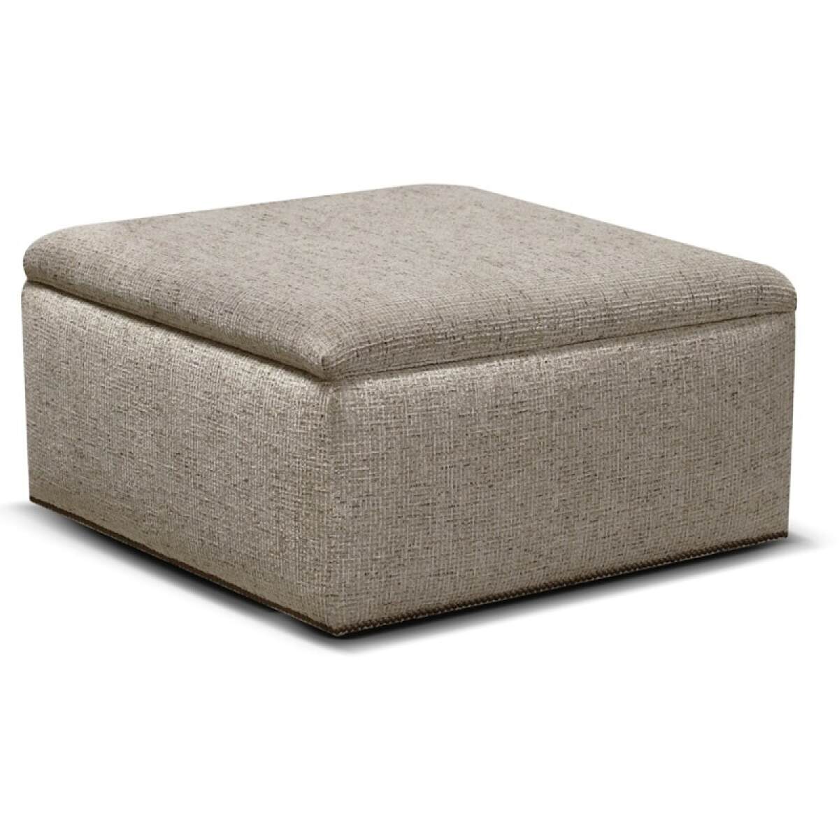 faacff30f719fc2911be2be3ee405eec Hendrix Storage Ottoman With Nails - Image 1
