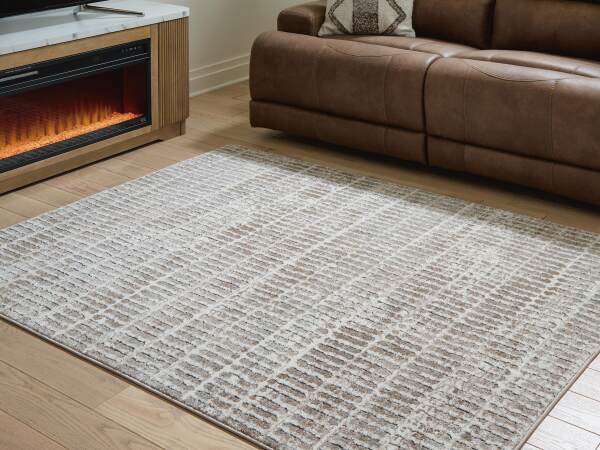 Fuadwick 5'3" x 7' Area Rug - Image 3