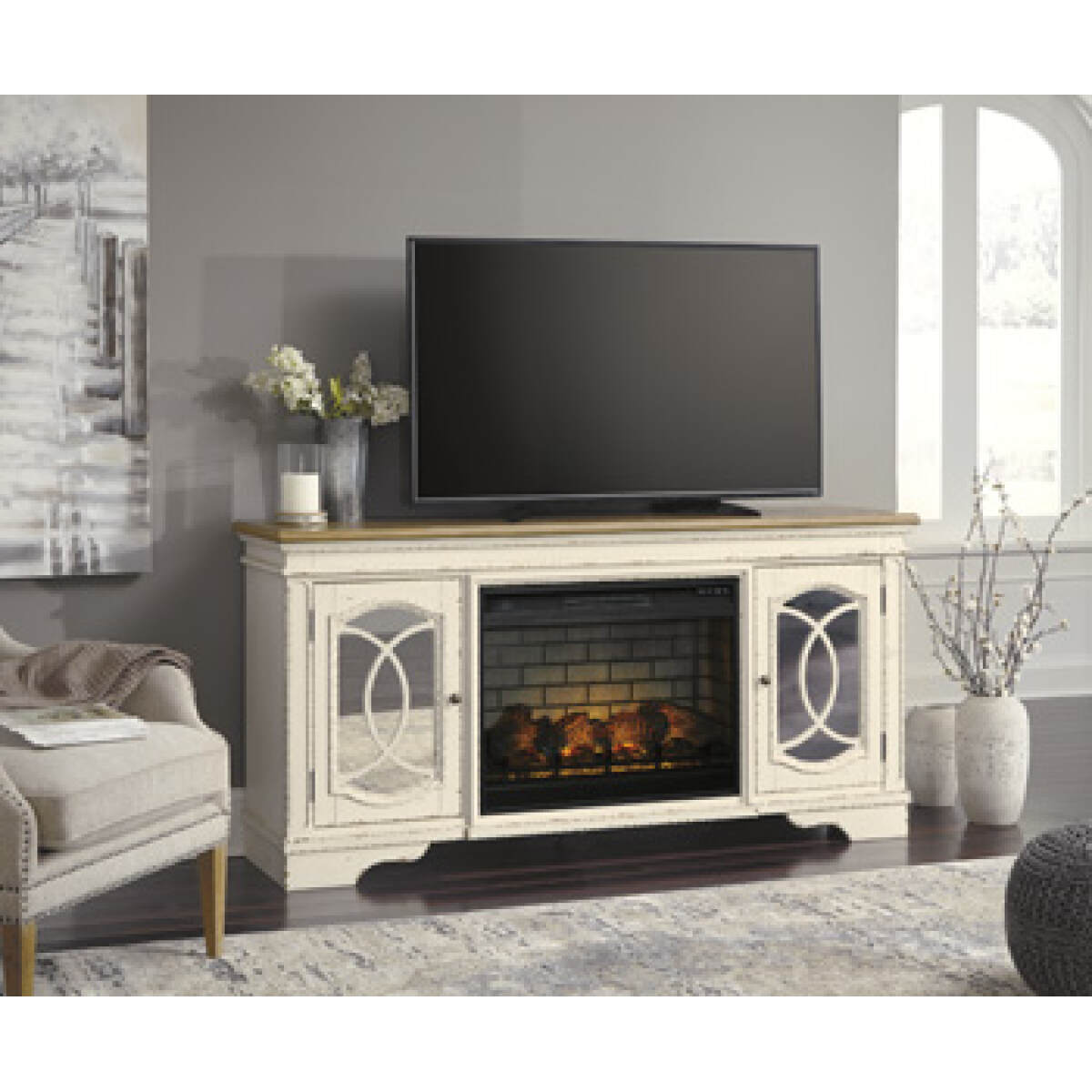 2537f90fbd3c51bb05233b65a8533ecf Realyn 74" TV Stand with Electric Fireplace - Image 1