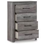 Bronyan King Panel Bed, Dresser, Mirror, Chest and 2 Nightstands - Image 6