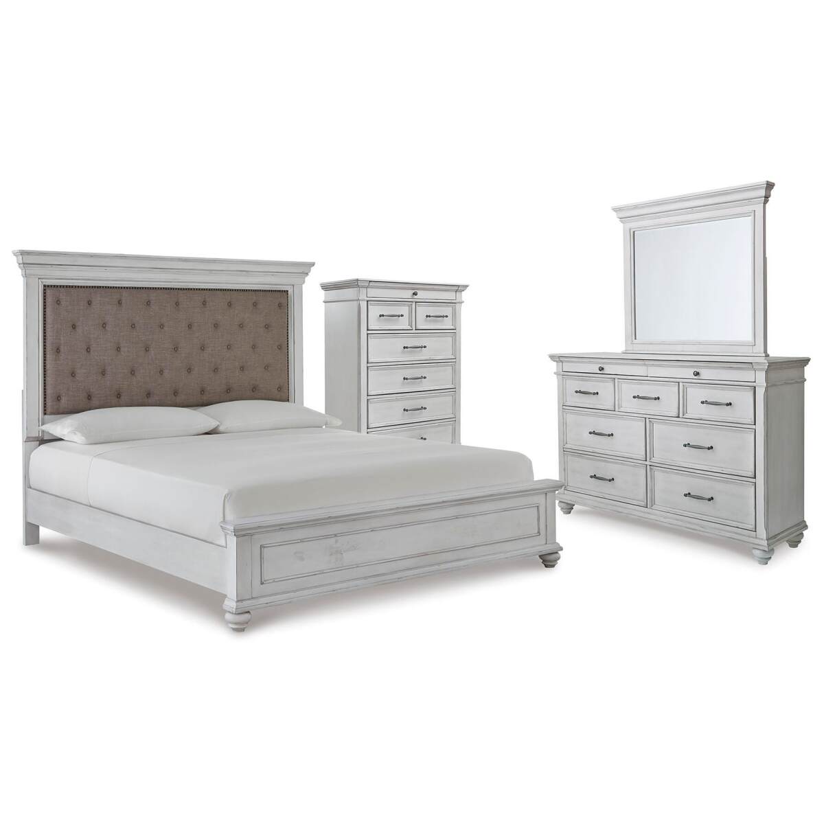 5e565411c6930ffd63a0de9a8db3e10e Kanwyn King Upholstered Panel Bed, Dresser, Mirror and Chest - Image 1