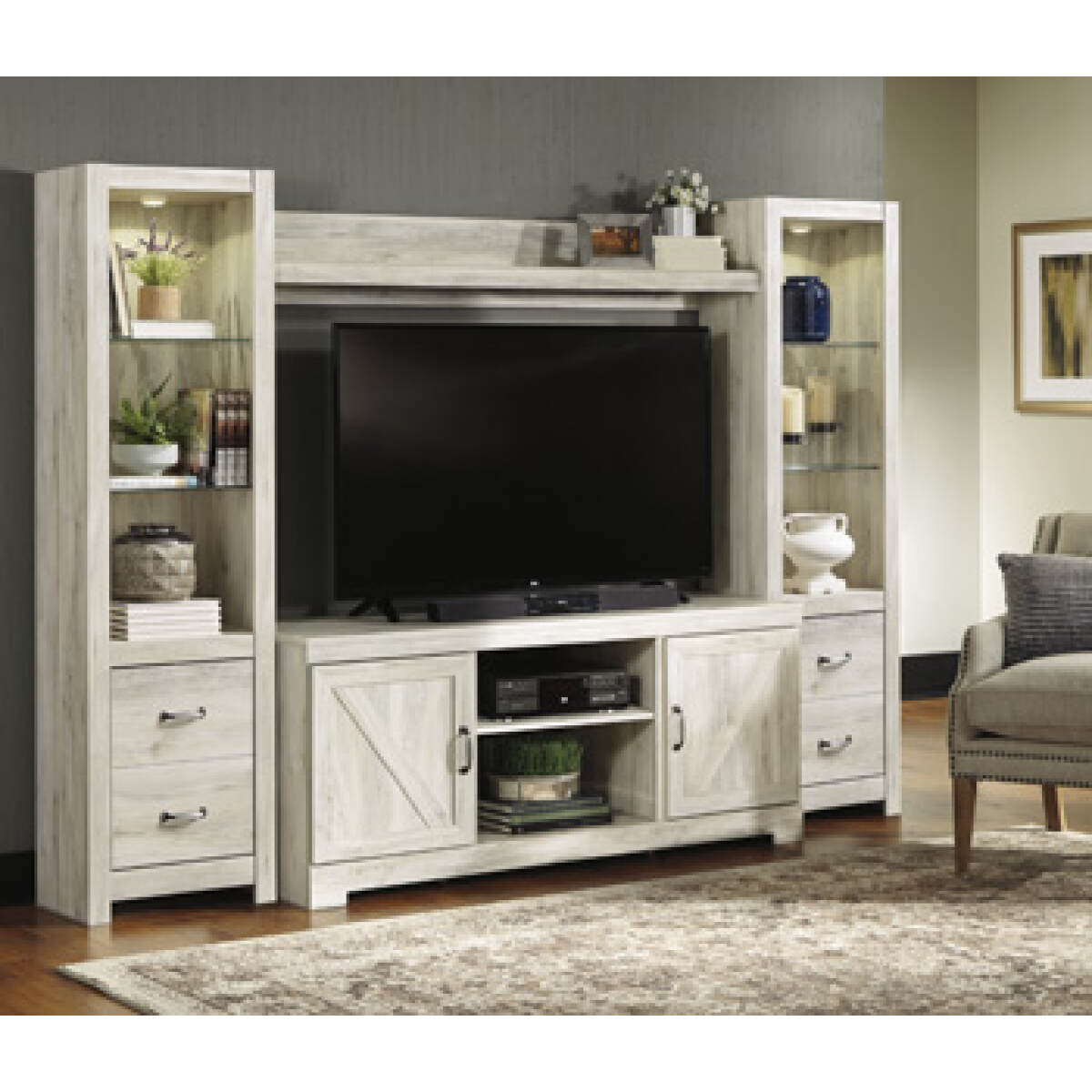 6edf7c9c42a90516f3feaea978c11cf5 Bellaby 4-Piece Entertainment Center - Image 1
