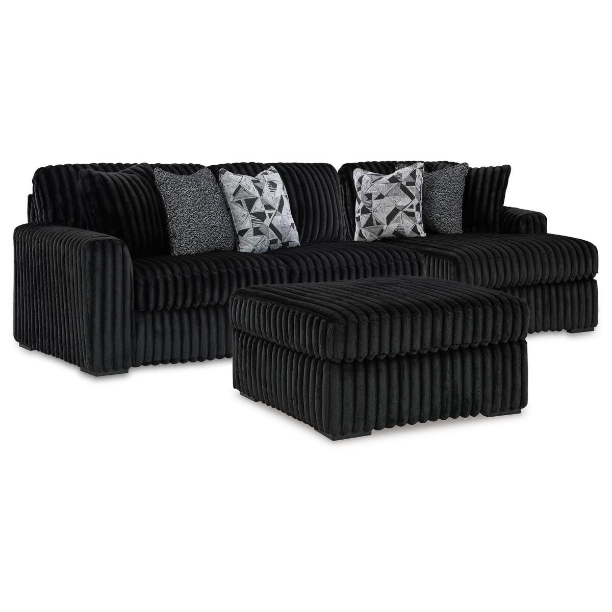 9357a1e4f5b2ca52897a83fdc65436a3 Midnight-Madness 2-Piece Sectional and Oversized Accent Ottoman - Image 1
