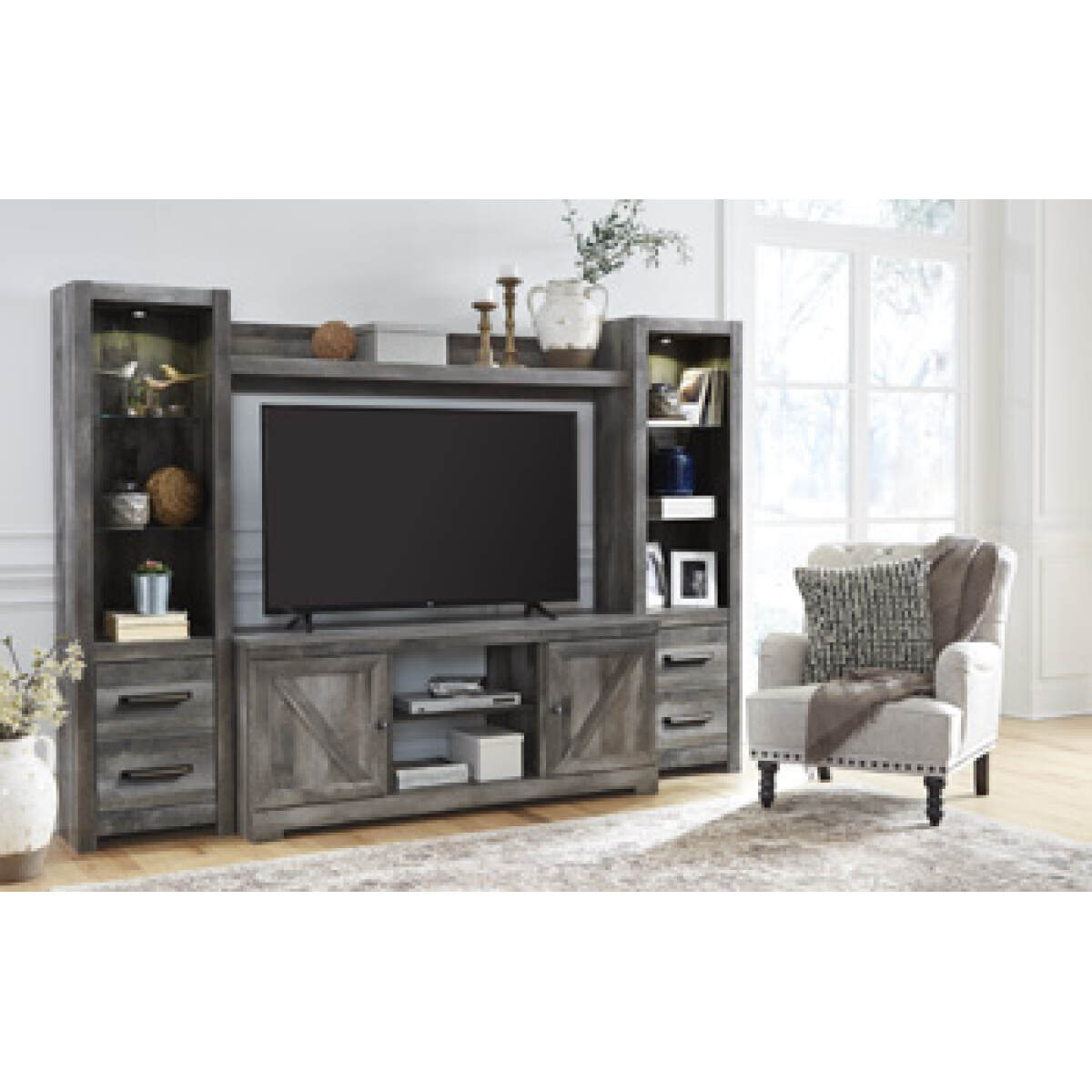 e015e932f334b5833c9ceb66cba07f2c Wynnlow 4-Piece Entertainment Center - Image 1